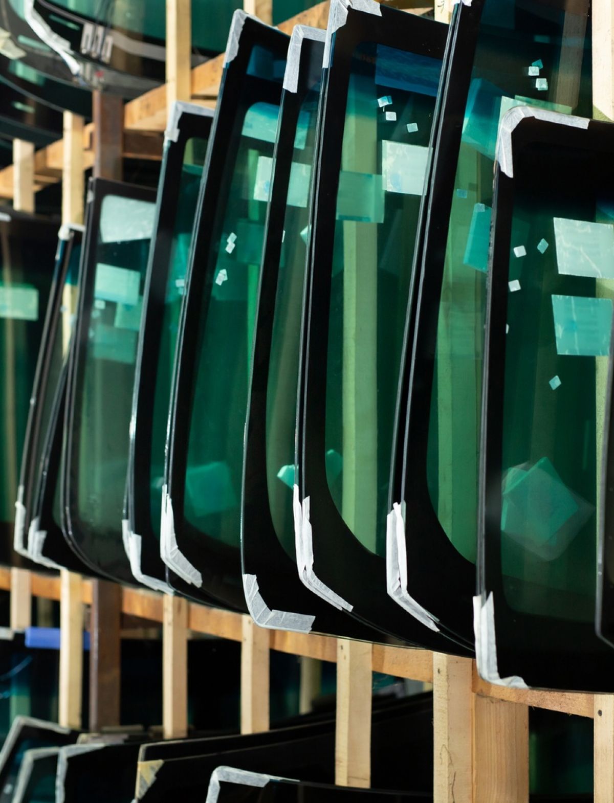 Auto Glass Supplier Windshields Stacked For Replacement Repair Services