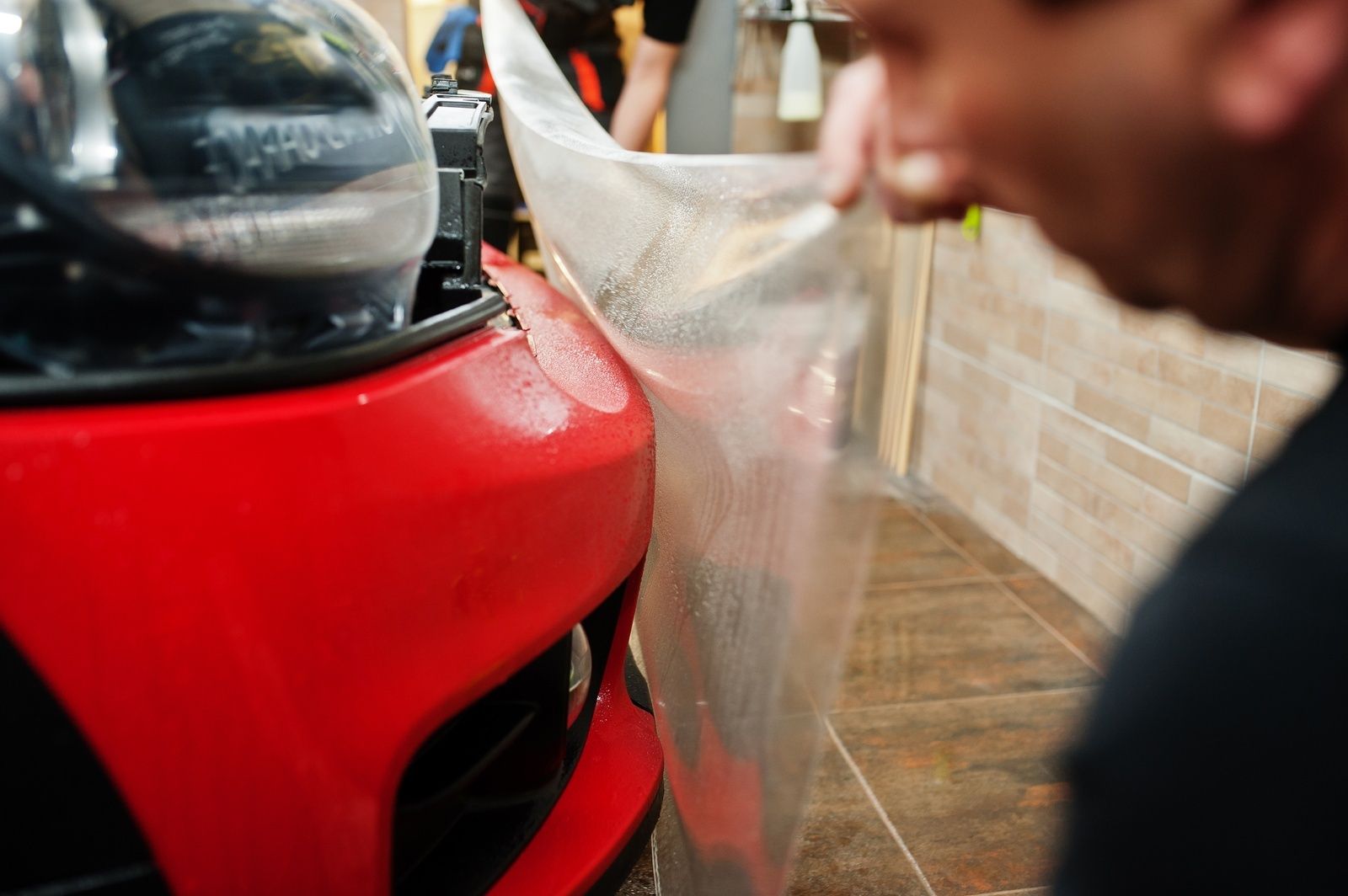 Applying Ppf To Red Car In Mannasas Vehicle Protection