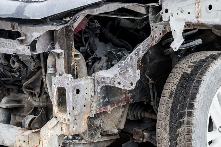 Damaged Vehicle Chassis With Frame Damage Exposed Parts