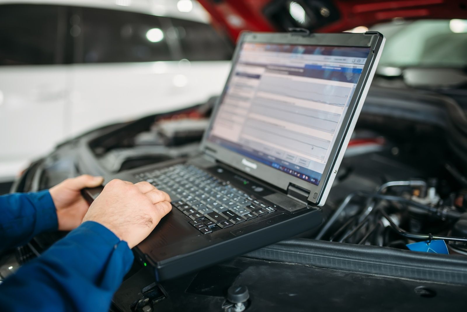Electronics Calibrations Service Diagnostic Laptop Engine Bay