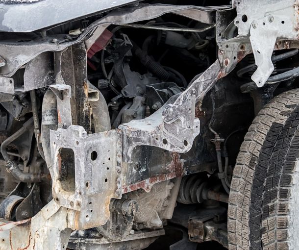 Damaged Vehicle Chassis With Frame Damage Exposed Parts