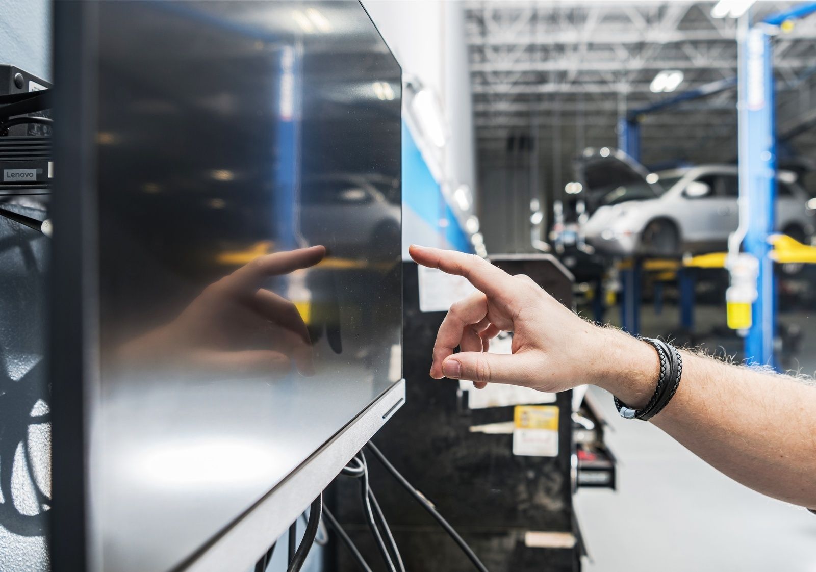 Electronic Calibration Service Technician Adjusts Monitor Display
