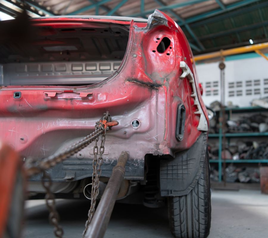 Red Car Frame Repair Service Damaged Rear End Repair Shop