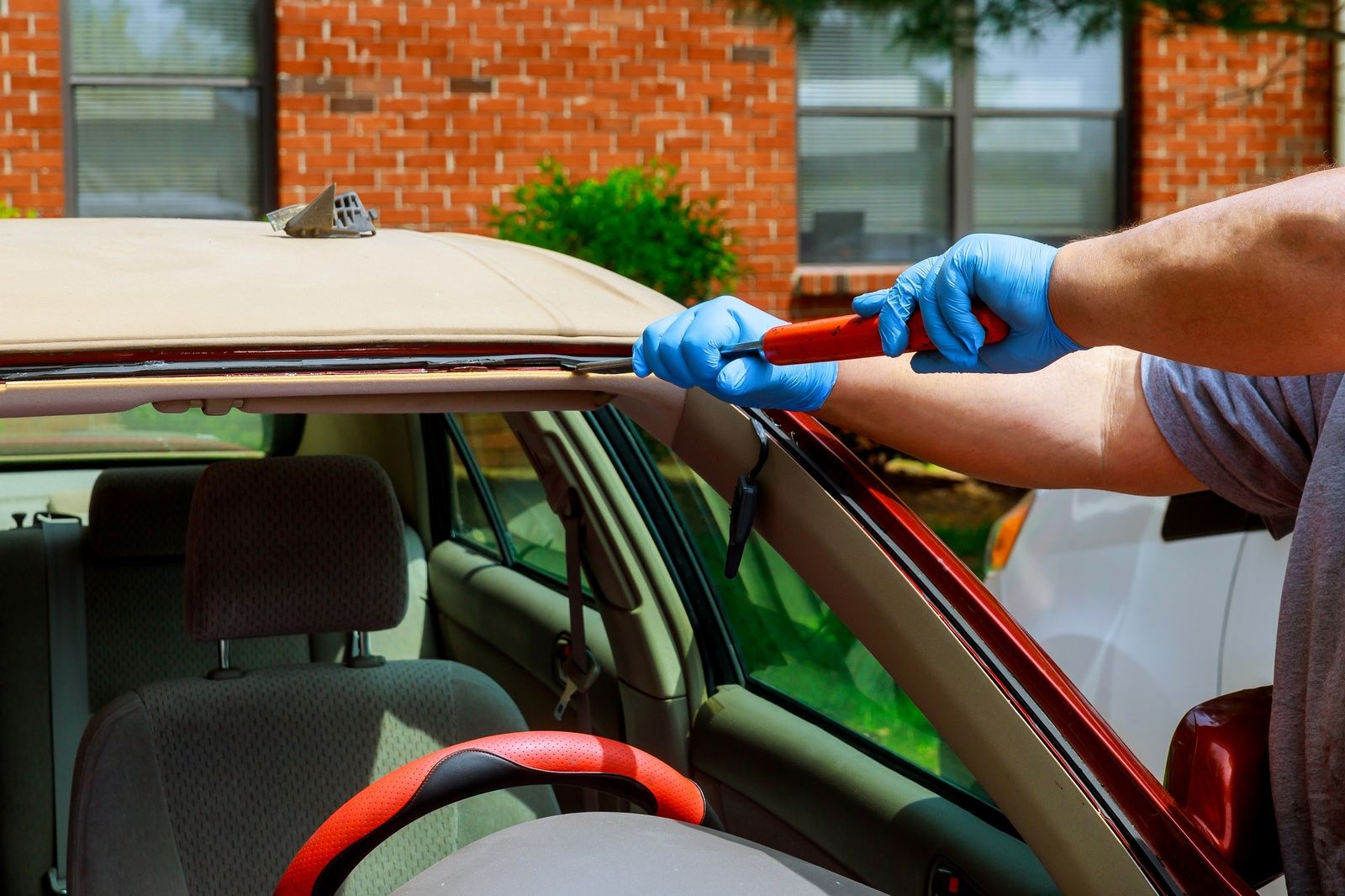 Auto Glass Repair Windshield Replacement Technician Installing Auto Glass